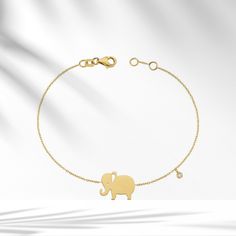 🐘8k/14k/18k Solid Gold Elephant Charm Bracelet with Dangle Diamond,Minimalist Gold Elephant Bracelet,Bazel Setting Dainty Valentines Day gift🐘 Description: 🐘Embrace the delicate beauty of our 8k/14k/18k Solid Gold Elephant Diamond Bracelet. A tiny, dainty masterpiece that adds a touch of enchantment to your style. 🐘 💎 Featuring a certified diamond, our Elephant Bracelet is a symbol of elegance and grace. 💎 Details of the Product: Weight: Approximately 1.72g Diamonds: 0.02ct Color: F Clarity: SI Piece: 1 Cut: Round 🐘 Always remember that you are stronger than you think. 🐘 Our Elephant Bracelet is more than jewelry; it's a fashionable statement that enhances your look with a touch of nature's charm. Every piece is handmade with precision, crafted from genuine 8K, 14K, or 18K real gol Elephant Charm Bracelet, Gold Elephant, Elephant Bracelet, Delicate Beauty, Elephant Charm, Fancy Jewelry, Selling Jewelry, Diamond Bracelet, Favorite Jewelry