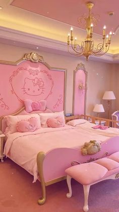 a hello kitty bedroom with pink furniture and chandelier