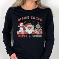 Office Staff Christmas Shirt makes the perfect shirt for the School Office or Admin crew fthis holiday season! T-shirt: This is made with a Gildan 64000 unisex soft-style t-shirt. Made from very soft materials, this tee is 100% cotton for solid colors. Heather colors and sports grey include polyester. The shoulders have twill tape for improved durability. There are no side seams. The collar is made with ribbed knitting to prevent curling damage. *100% ring-spun cotton *Light fabric *Tear-away la Office Christmas Shirts, Office Staff, Holiday Apparel, Squad Shirt, Everyday Items, Cotton Lights, Christmas Christmas, Christmas Shirt, Perfect Shirt