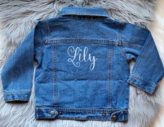 "Hello and welcome to my shop!! Here we have our super cute denim jackets. I can add a name to the front left or to the back of the jacket. These are perfect for that cute birthday picture. I can also add your favorite school or logo to them. Make sure to let me know what thread color at checkout. If not specified I'll do it in white If you would like to add flowers, stars, hearts or other designs to the jacket purchase extra monograms here: https://www.etsy.com/listing/796309653/add-to-my-order Customizable Blue Denim Jacket, Customizable Blue Denim Jacket With Long Sleeves, Customizable Denim Jacket For Fall, Customizable Denim Jacket For Spring, Customizable Blue Denim Jacket For Spring, Customizable Trendy Denim Jacket For Spring, Customizable Spring Denim Jacket, Trendy Customizable Long Sleeve Denim Jacket, Spring Customizable Denim Jacket