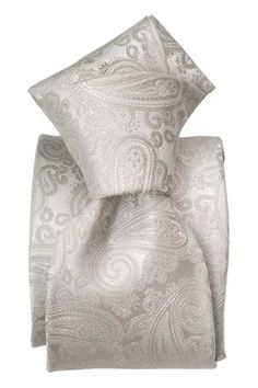 Experience a touch of timeless sophistication with our intricate woven jacquard paisley tie. Perfect for more formal occasions, evening wear or dinner jackets. Standard Length: Approx. 3.25" x 58.5". A classic tie width and length that is perfect for most men up to 6'2". 100% silk jacquard: It is made on a special jacquard loom, using different colored yarn-dyed threads to create the woven pattern. 3-fold construction: This ensures your tie maintains its shape and effortlessly creates a flawless Elegant White Suit And Tie Accessories For Party, Elegant Tailored White Suit And Tie Accessories, Elegant Wedding Suit And Tie Accessories, Classic Fitted Ties For Formal Occasions, Elegant White Suit And Tie Accessories For Wedding, Elegant White Wedding Suit And Tie Accessories, Elegant Business Suit And Tie Accessories With Paisley Print, Dapper Fitted Ties For Formal Occasions, Luxury Tailored Ties For Formal Occasions