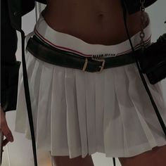 After Miu Miu's Much-Talked About Spring '22 Collection That Disrupted Office Dress Codes, This Season Miuccia Set Her Sights On The Tennis Court With A Collection That's Y2k-Meets-Preppyand Still Sates Our Desire To Show Off Ample Skin. This Ultra-Mini Skirt Has A Classic A-Line Cut Tailored From Pleated Sable With A Ribbed Waistband Designed To Hang Low On The Hips. Brand New With Tags. It 36 Fits Size 00/0 Xs Us 0-2 Miu Miu Pleated Skirt, Chic Miu Miu Mini Skirt, Miu Miu Fitted Summer Skirt, Elegant Miu Miu Mini Skirt, Chic Fitted Miu Miu Mini Skirt, Chic Fitted Mini Skirt By Miu Miu, Chic Miu Miu Bottoms For Spring, Chic Miu Miu Spring Bottoms, Chic Spring Bottoms By Miu Miu