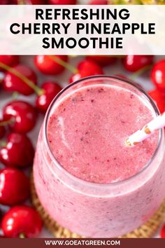 a pink smoothie with cherries in the background and text overlay reading refreshing cherry pineapple smoothie