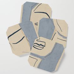 four coasters with faces drawn on them in blue and beige colors, each featuring a man's face