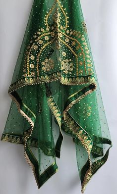 Absolute one of a kind, hand crafted green beaded net shawl. This shawl is a show stopper! Take notice of the heavily embroidered border and beaded centre, that would adorn any bride it is placed upon. We absolutely stand by our products and will be here to support you along your whole shopping journey. You can also find us on Instagram @AfghanWeddingThingss Feel free to send any inquiries about any of our products. Wedding Shawls, Embroidered Border, Wedding Shawl, Shawls And Wraps, Wedding Accessories, Henna, Shawl, Hand Crafted, Bathing Beauties