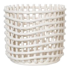 a white basket is shown on a white background