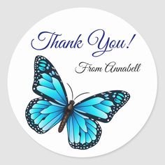 a blue butterfly sticker with the words thank you from annuele on it