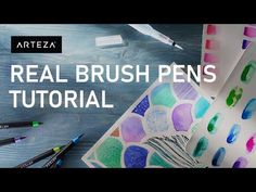 the words real brush pens are next to some art supplies