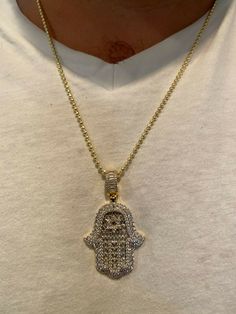 "Iced Out Star of David Hamsa Hand of God Pendant LISTING IS FOR ONE PENDANT, NO CHAIN Hand of G-d Together with the star of David it a very powerful symbol! SUPER ICY! Solid 925 sterling silver...never turns green This is a lifetime piece 1.5\" big - 2\" w bale Weighs 16.4 grams Color doesn't change as its real 925 sterling silver 14k gold option has real yellow gold bonded to natural silver Handmade in Italy Very detailed 3-D micropave design Micropaved handset simulated diamonds (CZ) Nice mix Iced Out Pendant Men, Mens Necklace Fashion, God Pendant, Hamsa Pendant, Diamond Ice, Star Of David Pendant, Mens Necklace, Gold Bond, Family Jewels