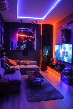 a living room filled with furniture and two large tvs mounted on the wall next to each other