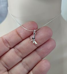 TINY Solid 925 Sterling Silver - 16mm (see photos) Miniature Dragonfly Charm with a well made .8mm Sterling Silver Cable or Box Chain and Gift Box.  As a spirit animal, the dragonfly is connected to the symbolism of change and light. When the dragonfly appears nearby, it may remind you to bring a bit more lightness and joy into your life.  Choice of Beautiful Gift Box. * NOTE: We cannot customize or personalize our necklace card inserts, they come AS IS.  Add a Birthstone Charm here: https://www Silver Initial Charms, Dragonfly Jewelry, Dragonfly Charm, Dragonfly Necklace, Insect Jewelry, Sterling Silver Initial, Dragonfly Pendant, Jewelry Minimalist, Printed Jewelry