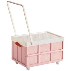 a pink and white toy storage box with wheels