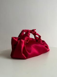 Small satin cherry bag with knots. Stylish small handmade bag that is suitable for any occasion. Furoshiki knot bag is soft, closes with a magnetic button. This knotted bag is made in a vintage style based on the Japanese technique of tying a silk women's scarf into a handbag. Elegant small woman bag is very roomy - fits a phone, wallet, keys, makeup. Perfect wedding purse, evening bag. Fashion handbag can be sewn from satin or velvet. I have a huge selection of colors, more than indicated in th Navy Purse, Satin Purses, Origami Bag, Bags Online Shopping, Satin Clutch, Red Clutch, Wedding Purse, Red Bag, Authentic Designer Handbags