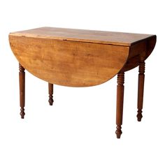 an old wooden table with two legs and a curved top on one end, against a white background