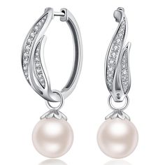 PRICES MAY VARY. 【PEARL EARRING】 ZDaoBen Elegant sterling silver pearl dangle earrings are the perfect fashion accessory for woman! Pearl hoop earring is more secure and not fall off easily. Whether it's for everyday or party, it can match well with your outfit well. 【DELICATE WORKMANSHIP】: Featuring white pearls with a high luster and a high-quality shine that will hold their beauty for years to come. Micro pave setting 5A+ cubic zirconia on pearl drop earrings, shine like real diamond. 【HYPOAL Sterling Silver Drop Pearl Earrings With Lever Back, White Gold Huggie Earrings With Lever Back For Gifts, Classic Silver Huggie Pearl Earrings, Elegant Sterling Silver Huggie Earrings With Pearl Drop, Elegant Sterling Silver Huggie Earrings With Ear Wire, Silver Hoop Pearl Earrings For Gift, Silver Hoop Pearl Earrings As Gift, Silver Pearl Hoop Earrings For Pierced Ears, White Gold Dangle Hoop Earrings For Gift