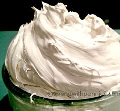 whipped cream in a glass jar on a table