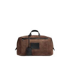 A versatile design fit for a range of occasions, the Alanah duffle bag is an elevated take on a  practical accessory. Crafted from suede, the spacious bag is embellished with a supple leather details. Luxury Textured Leather Brown Duffle Bag, Luxury Brown Coated Canvas Duffle Bag, Luxury Rugged Leather Duffle Bag, Rugged Leather Rectangular Duffle Bag, Luxury Leather-lined Duffle Bag For On-the-go, Personalized Jacket, Father's Day Specials, Ski Accessories, Boot Accessories