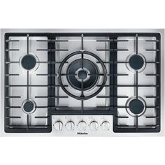 a stainless steel stove top with four burners