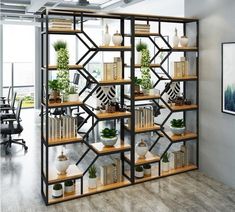 a book shelf filled with lots of books and plants