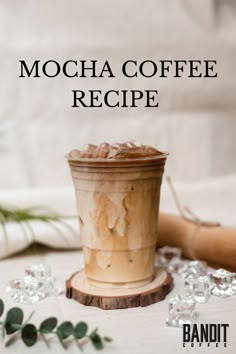 mocha coffee recipe in a cup with ice cubes