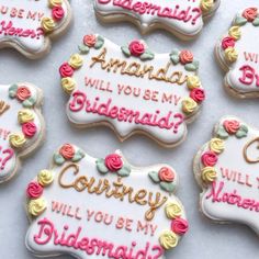 decorated cookies that say, will you be my bridesmaid?