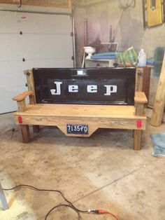 a wooden bench with the word jeep on it