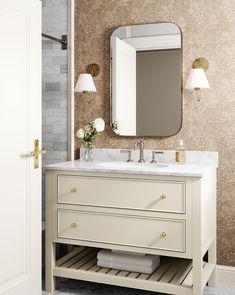 a bathroom vanity with two drawers and a mirror above it