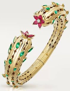 Bracelet, Cactus de Cartier: Yellow gold 750/1000, set with 46 emeralds, 10 rubies and 2 brilliant-cut diamonds totalling 0.15 carats. Some Like It Hot, Delicate Flower, Dream Jewelry, Trendy Jewelry, Turquoise Jewelry, Brilliant Cut Diamond