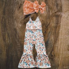 We suggest pairing this jumpsuit with or Sunny Days With Mama bow! *Please note the suggested bow is not apart of the set but is available for purchase separately.* Fitted Summer Jumpsuits And Rompers With Bow, Spring Party Jumpsuits And Rompers With Bow, Spring Party Jumpsuit With Bow, Sunflower Jumpsuit, Summer Bow Tie Sets, Cute Summer Sets With Bow Detail, Cute Summer Sets With Bow, Baby Girl Country Outfits, Cowgirl Baby Outfits