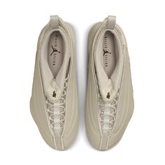 This Air Jordan 15 sports a full Beige color blocking. It features a leather build with tonal exposed stitching, mesh tongues, and a Jumpman label on the lateral. Her “Blohsh” logo inside of the tongue along with “Billie Eilish” text on the insole with a Jumpman logo in the middle completes the design. SKU: DN2863-200 Release Date: 28 Oct 2021 Color: Beige Jordan 15 Billie Eilish, Aesthetic Leaves, Jordan 15, Nike Snkrs, Jumpman Logo, Womens Air Jordans, Brand Collaboration, Beige Shoes, Latest Sneakers