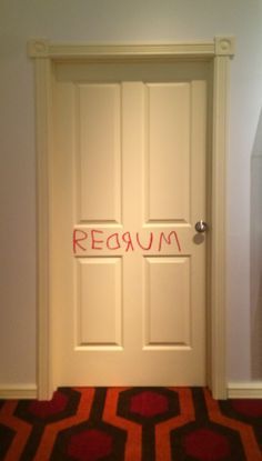 an open door with the word'return'written on it in red and orange