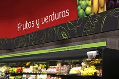 a fruit and vegetable section in a store with the words frutas y verduras above it