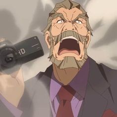 an old man holding a camera up to his face while wearing a suit and tie