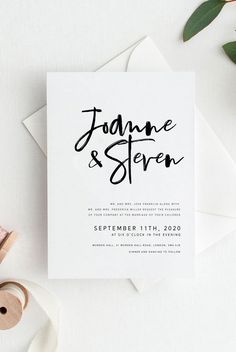 a white card with black ink that says, jahanne and stepen on it