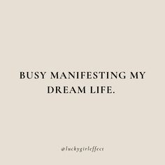 a quote that says, busy manfesting my dream life