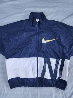 Vintage 1990s Nike Big Logo Swoosh Big Spellout Windbreaker  In great condition  Light stains/ spots on letters logo 9/10 XL 28 x 28.5 Pit to Pit Any questions feel free to reach out! Nike 90s Vintage Blazer, Nike Big Boys, Sweet Nike Vintage, Nike 90s Vintage Women, Nike 1990 Vintage Hoodie, Nike Windbreaker Jacket Vintage, Vintage Nike Pants Old, Nike 90s Vintage Track, Nike 90s Vintage Windbreaker