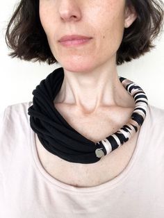 "Striking, cool and very soft necklace made with two kinds of fabric, one solid color and the other with a beautiful abstract print. What I like of this design is that you can wear it all year round. 10% OFF here > http://eepurl.com/damm-L * Length - 18 cms = 7\" app. * Color - Black and abstract print. * Material - 100% peruvian cotton jersey and spandex fabric. Care instructions: * Handwash your bnn necklace using cold / lukewarm water and mild detergent. * To remove stains, gently knead the w Wet Necklace, Soft Necklace, Leather Statement Necklace, Neon Necklace, Neon Bracelets, Necklace Fabric, Ivory Necklace, Vintage Jewelry Diy, African Beads Necklace