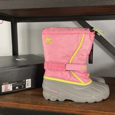 These Sorel Boots Are New In Box. Color On Box Is Blooming Pink/Chrome Gray. Style Is “Flurry “. Size 6 (Youth). New With Tags And Box. Please See Close-Up Picture Of One Boot Where There Appears To Be A Pin Prick Hole At The Top Where A Security Tag Was Attached. Non-Smoking Home. **Please Note I Will Wrap Box In Brown Shipping Paper To Mail. Pink Chrome, Sorel Boots, Close Up Pictures, Box Color, Rain And Snow Boots, Snow Boots, Pink Grey, Kids Shoes, Gray Color