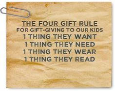 a piece of paper that has some type of sign on it with the words, the four gift rules for giving to our kids