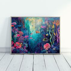 an underwater scene with fish, corals and other marine life is framed in a wooden frame