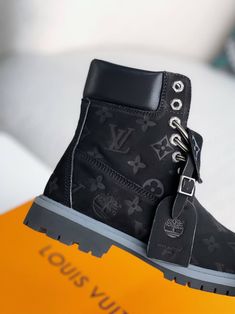 Embrace urban sophistication with these Timberland-inspired boots, reimagined in a sleek black colorway with the iconic Louis Vuitton monogram. Crafted with premium materials and meticulous attention to detail, these boots offer a unique blend of rugged functionality and high-fashion flair. Conquer the city streets in style and comfort. Disclaimer: This product is inspired by the Louis Vuitton x Timberland design but is not an official Louis Vuitton or Timberland product. Louis Vuitton Timberland Boots, Custom Timberland Boots, Timberland 6 Inch, Timberland Boots Women, Fall Winter Jacket, Timberland 6, Urban Sophistication, Timberlands, Louis Vuitton Boots