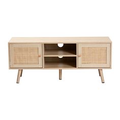 an entertainment unit with wicker doors and drawers