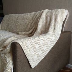 a couch with a blanket on top of it