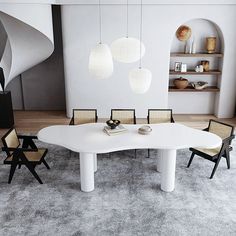 a large white table with chairs around it in a room that has carpeted flooring