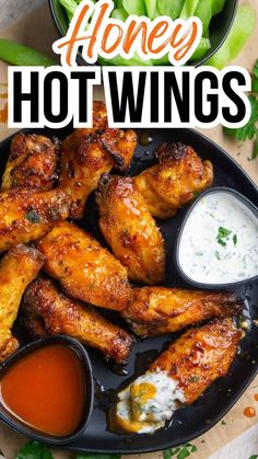 hot wings on black plate with small black bowls of ranch dressing and hot sauce. Title Text: Honey Hot Wings Honey Barbeque Wings, Honey Hot Wing Sauce, Honey Buffalo Wings, Honey Hot Wings, Honey Chicken Wings Recipe, Hot Wings Recipe, Tender Recipes, Cheesy Chicken Recipes, Chicken Wing Dip