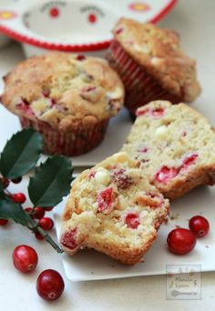 cranberry muffins on a plate with holly