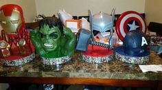 there are many avengers masks on the table