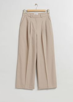 Tailored high-waist trousers crafted from a cotton blend. Cut in a wide-leg, high-waist style with deep centre front pleats and press creases. Finished with two front slanted pockets and two back welt pockets, a zip fly with hook and bar closure, and belt loops. Length of inseam: 76cm / 29.9" (EU 36 / UK 8 / US 4) Capsule Wardrobe Essentials, Womens Trousers, Ponte Leggings, Outfit Formulas, Roll Neck Sweater, Blue Trousers, Slim Leg Pants, Mini Slip Dress, Clothing Essentials