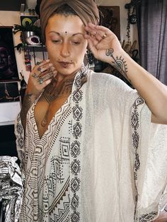 Tribal cotton cardigans with embroidery , perfect to wear on the beach or in the evening on your favourite outfit. Hand printed and made in India. Black or natural colour available. Hand printed so colours my varie a bit. Unisex and for all sizes. White Boho Print Kimono For Beach Cover-up, Bohemian Kimono With Boho Print For Beach Cover-up, Bohemian V-neck Free Size Kimono, Bohemian Tunic Cover-up For Festivals, V-neck Boho Print Kimono For Beach Cover-up, White V-neck Bohemian Kimono, Boho Print Tunic Kimono For Beach Cover-up, Beige Bohemian Kaftan For Summer, Bohemian Beige Kaftan For Beach Cover-up