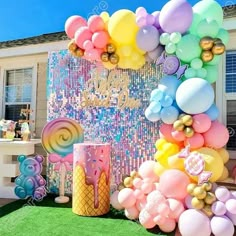 an ice cream themed birthday party with balloons and streamers